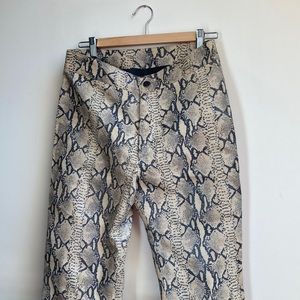 Leather pants, Snake Print. “I Am Gia,” real deal.